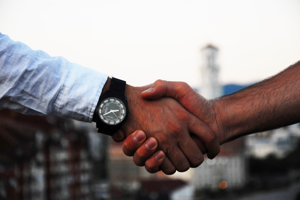 translation services handshake between translator and client